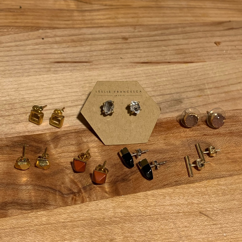 Seven pairs of stud earrings
